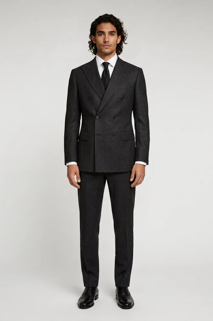 Men's Blutailor Black Double-Breasted Suit crafted from premium terry rayon fabric, featuring a classic black finish, double-breasted blazer with peak lapels, matching tailored trousers, structured silhouette, and refined craftsmanship, ideal for business wear, weddings, black-tie events, formal occasions, and sophisticated evening dressing.