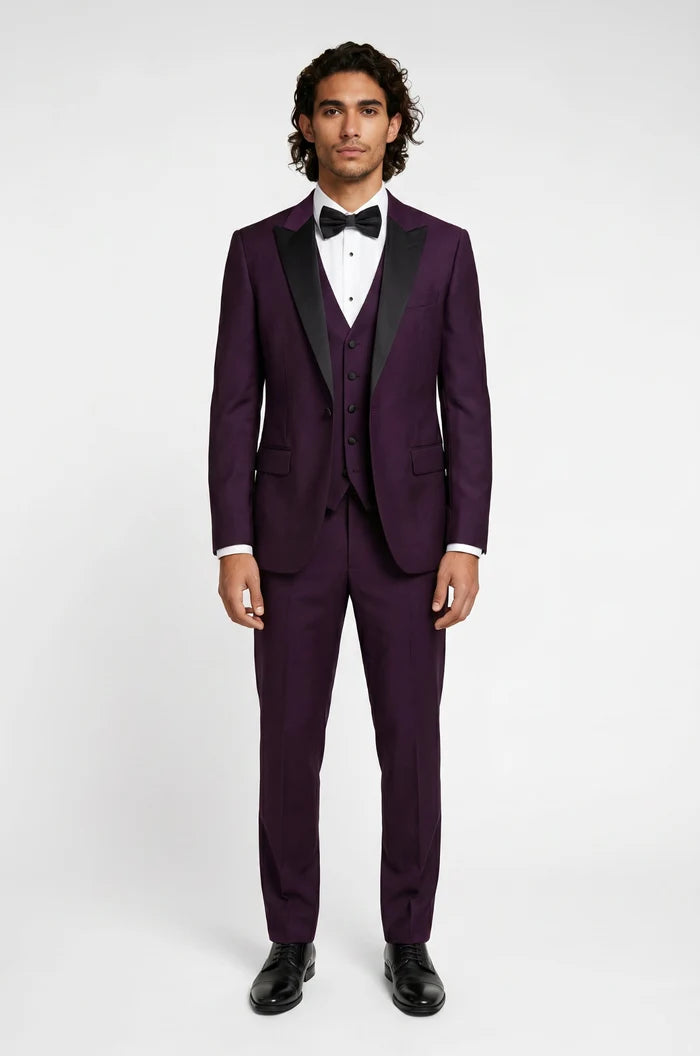 Blutailor plum peak lapel 3 piece tuxedo in premium fabric with a custom tailored fit, featuring a sleek blazer, waistcoat, and trousers for a bold and sophisticated formal look.