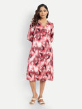Women’s red printed Dezi midi dress with long sleeves and elegant relaxed fit