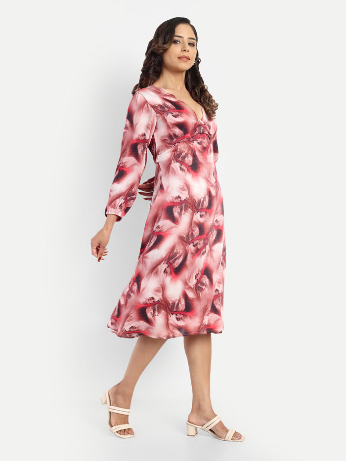 Women’s red printed Dezi midi dress with long sleeves and elegant relaxed fit