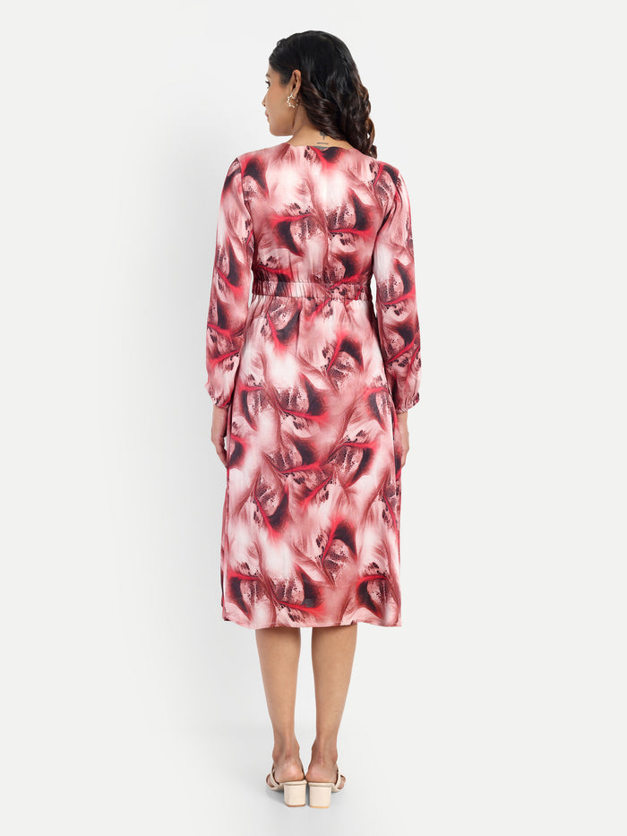 Women’s red printed Dezi midi dress with long sleeves and elegant relaxed fit