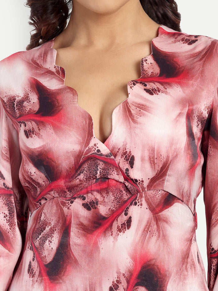 Women’s red printed Dezi midi dress with long sleeves and elegant relaxed fit