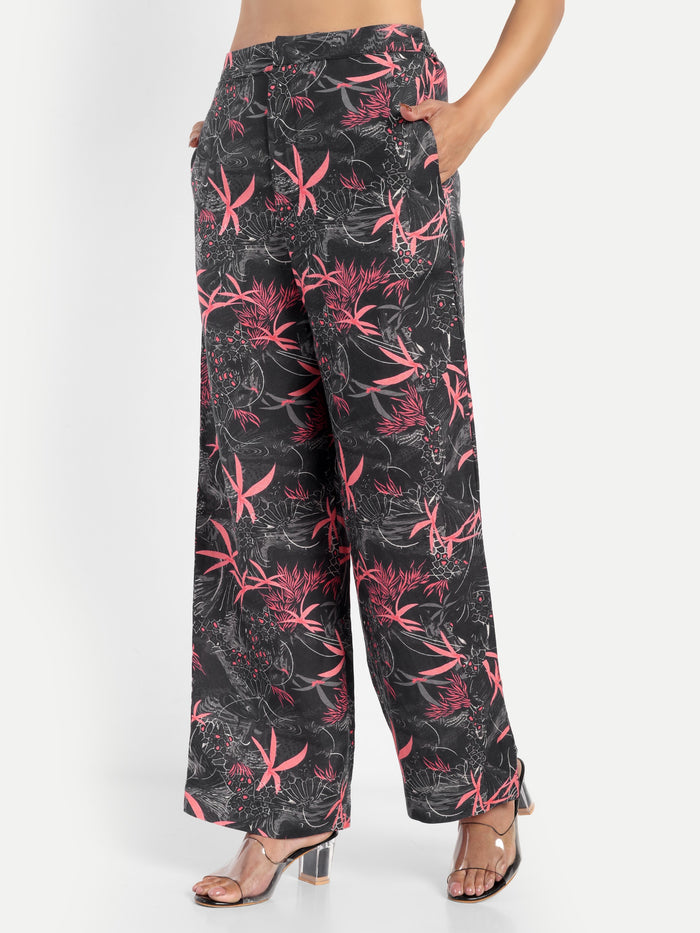 Women’s black printed Freya wide-leg pants with relaxed fit and statement floral design