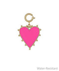 Hot pink enamel heart charm with gold trim and clasp