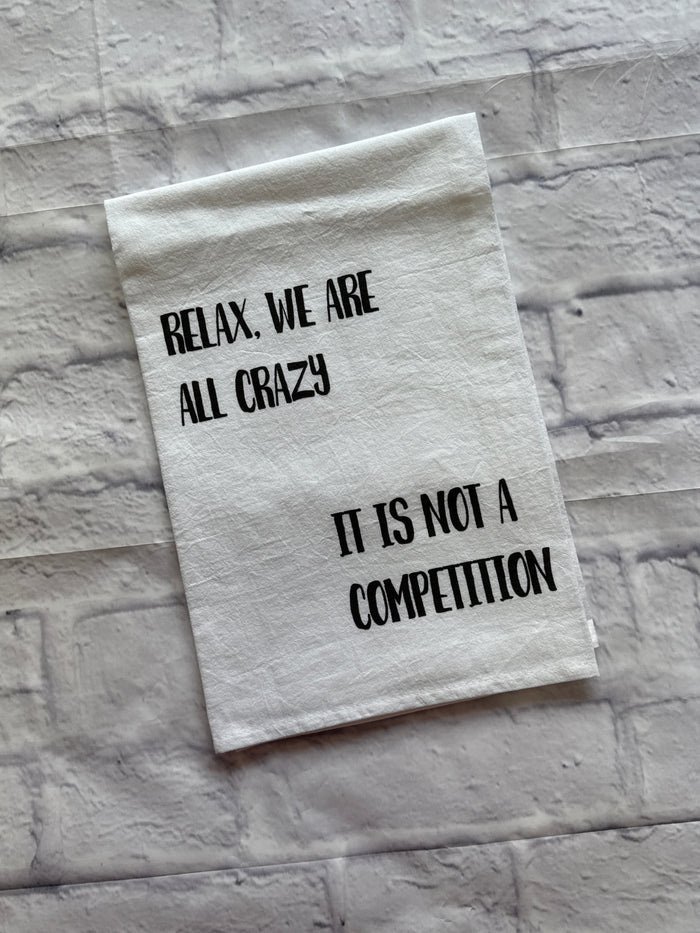 “It Is Not A Competition” Tea Towel