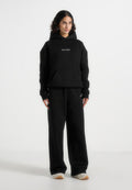 js001-unisex-signature-relaxed-fit-hoodie-black
