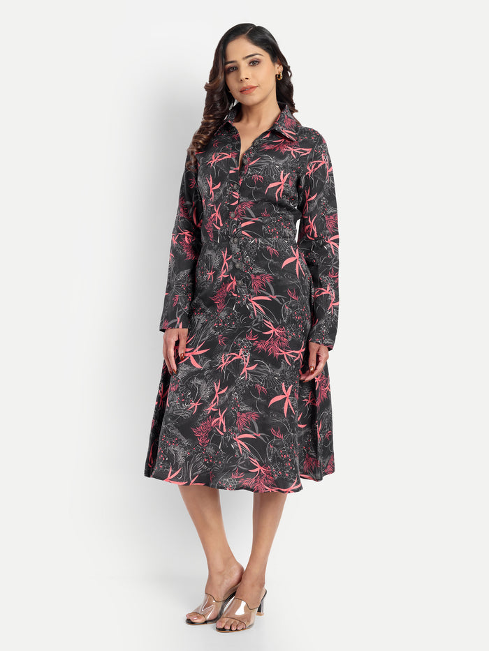 Women’s black printed Luna midi dress with long sleeves, button-down front and elegant fit