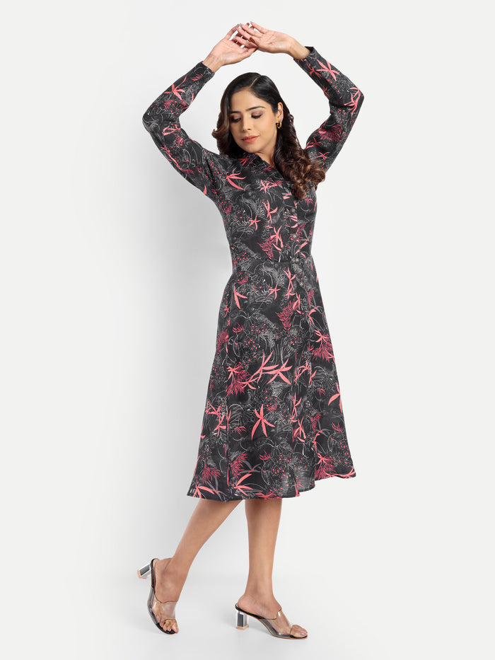 Women’s black printed Luna midi dress with long sleeves, button-down front and elegant fit