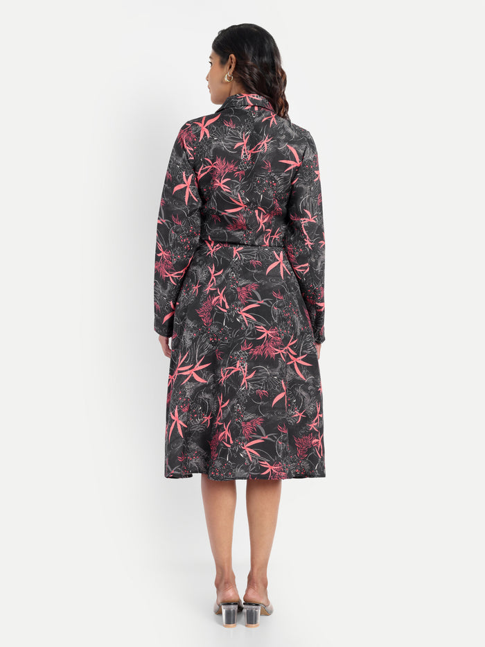 Women’s black printed Luna midi dress with long sleeves, button-down front and elegant fit