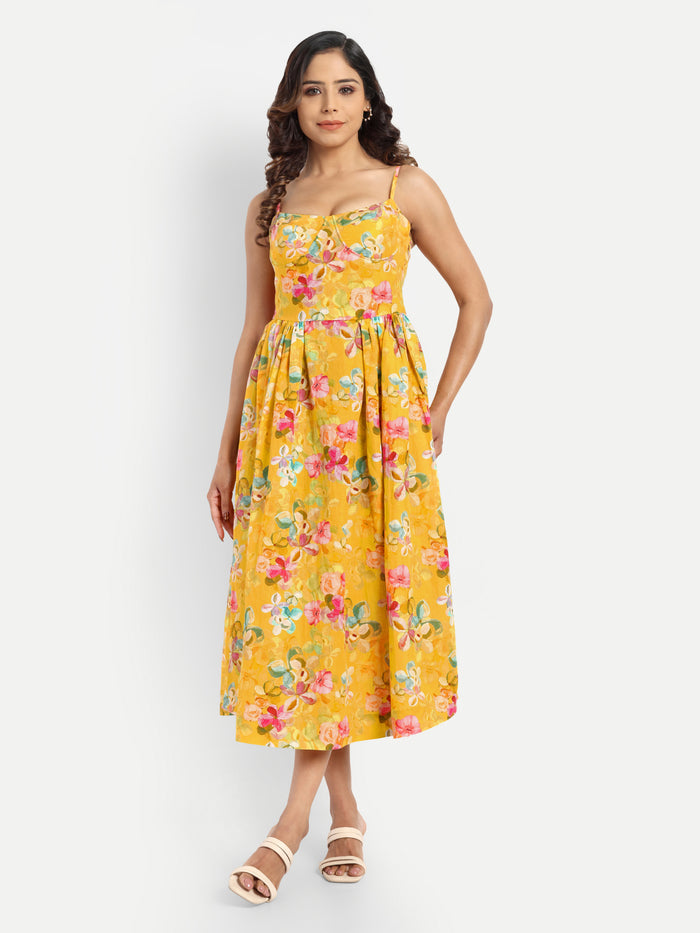 Women’s yellow floral Meto midi dress with strappy sleeves and flowy summer silhouette