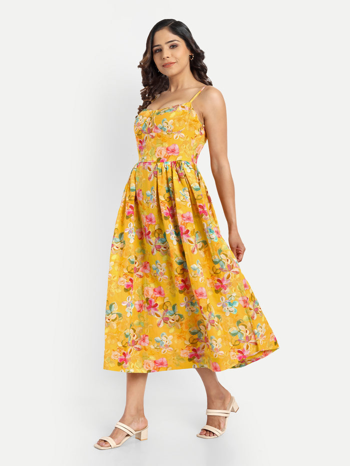 Women’s yellow floral Meto midi dress with strappy sleeves and flowy summer silhouette