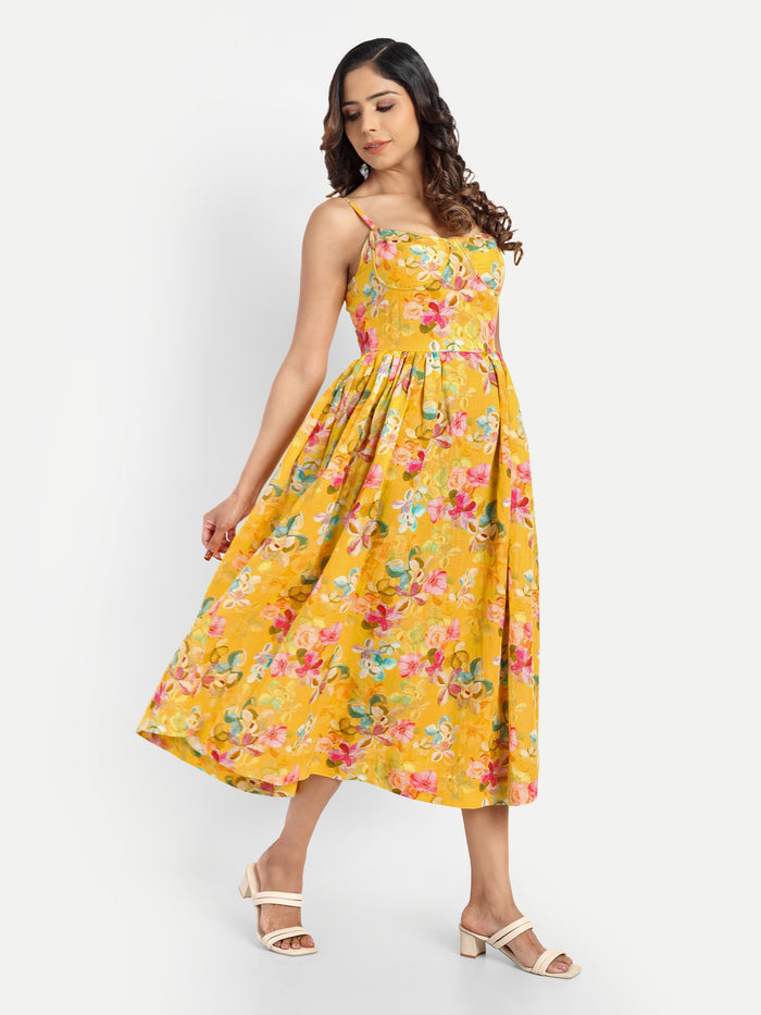 Women’s yellow floral Meto midi dress with strappy sleeves and flowy summer silhouette