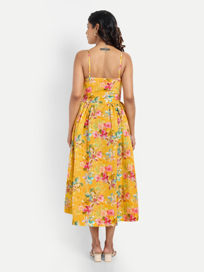 Women’s yellow floral Meto midi dress with strappy sleeves and flowy summer silhouette