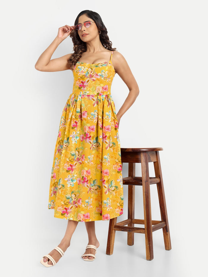 Women’s yellow floral Meto midi dress with strappy sleeves and flowy summer silhouette