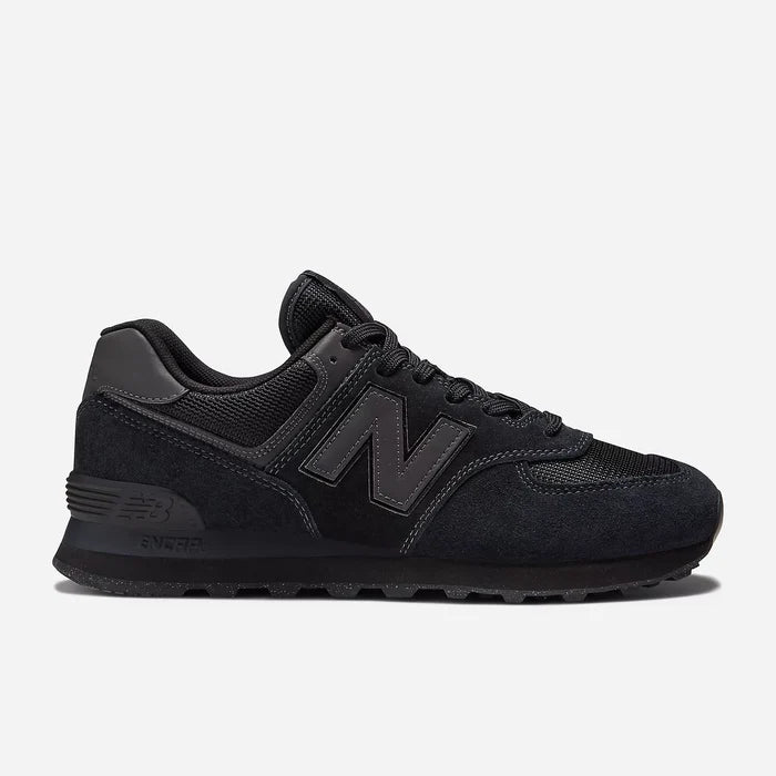 Black New Balance sneaker on a light gray background