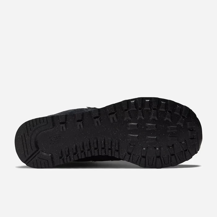 Black shoe sole on a light gray background