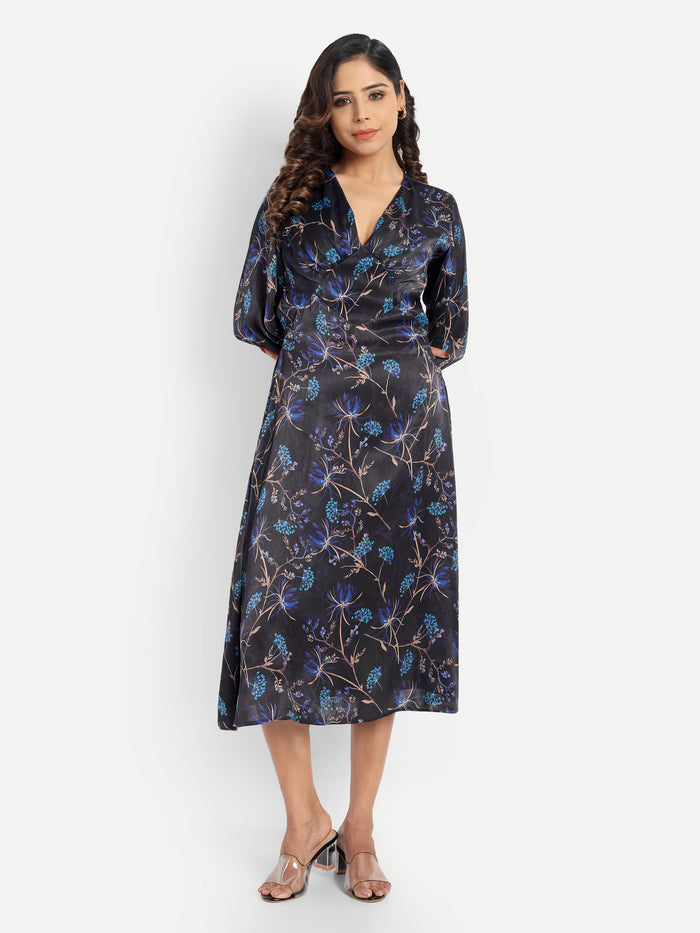 Women’s black and blue floral Reko midi dress with V-neck and elegant flowy fit