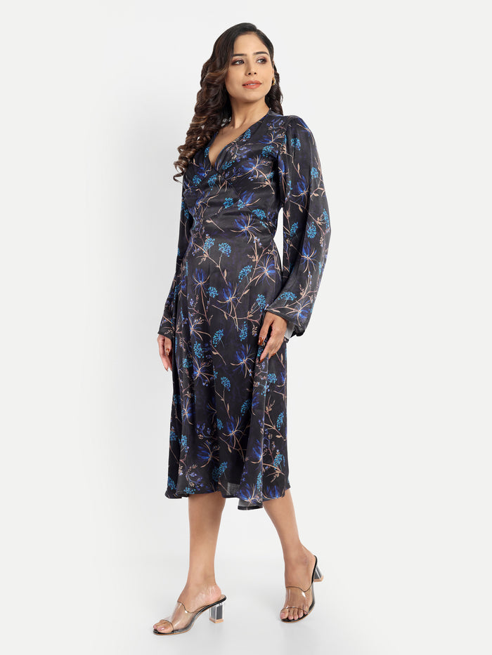 Women’s black and blue floral Reko midi dress with V-neck and elegant flowy fit