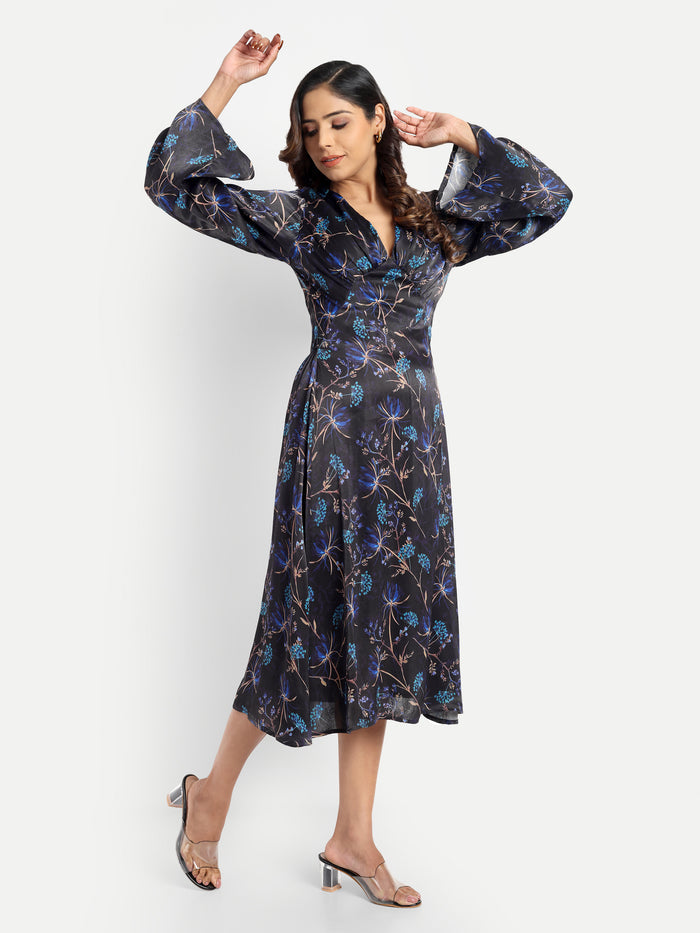 Women’s black and blue floral Reko midi dress with V-neck and elegant flowy fit