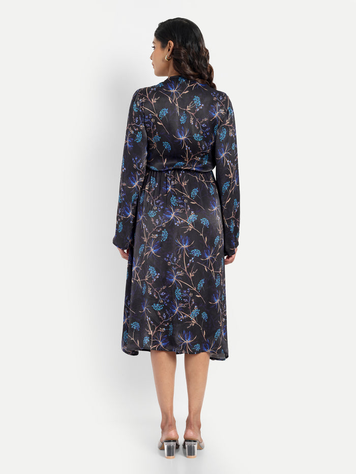 Women’s black and blue floral Reko midi dress with V-neck and elegant flowy fit
