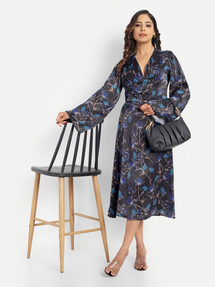 Women’s black and blue floral Reko midi dress with V-neck and elegant flowy fit