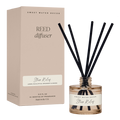 Reed diffuser with black sticks and a beige box labeled 'Sweet Water Decor' on a white background.