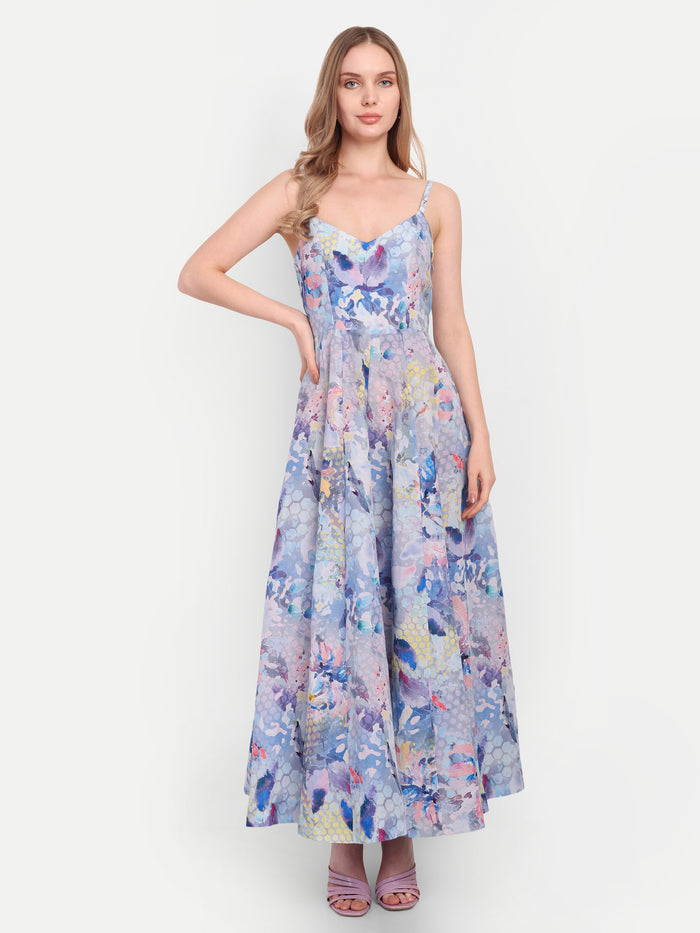 Luxury women’s blue floral Sumi maxi dress with elegant flowy silhouette and designer look