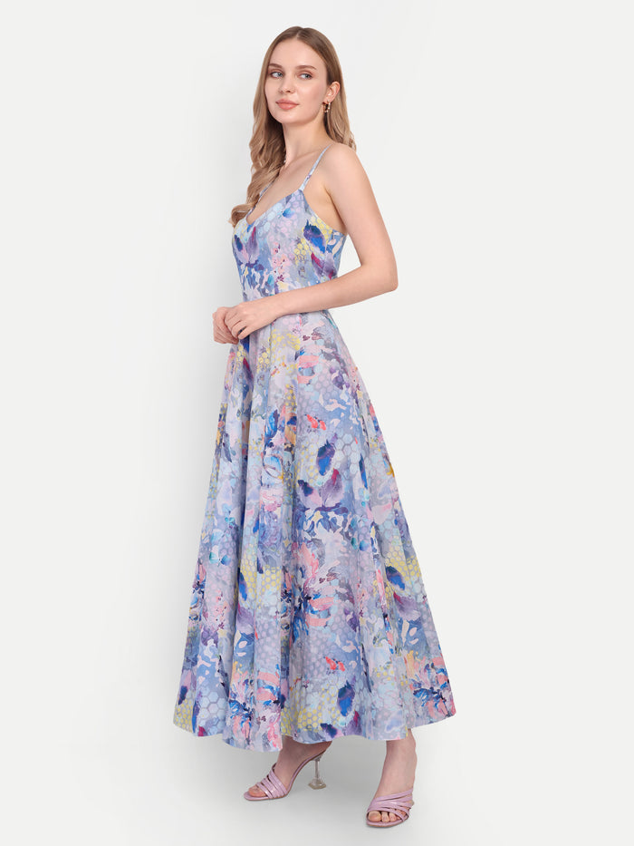 Luxury women’s blue floral Sumi maxi dress with elegant flowy silhouette and designer look