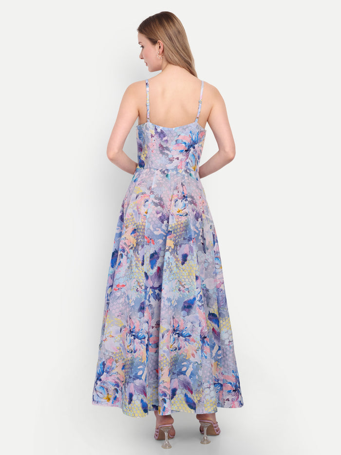 Luxury women’s blue floral Sumi maxi dress with elegant flowy silhouette and designer look