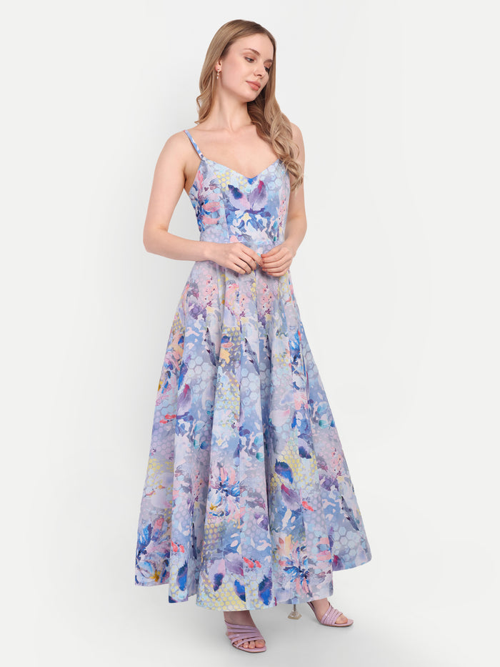Luxury women’s blue floral Sumi maxi dress with elegant flowy silhouette and designer look