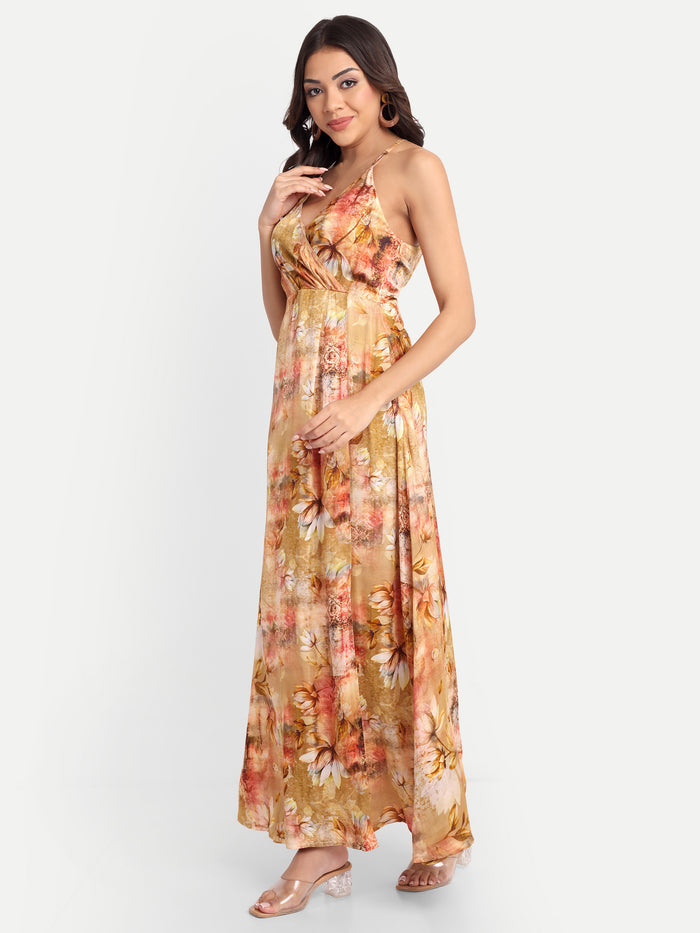 Women’s golden floral Vento maxi dress with halter neck and flowy silhouette