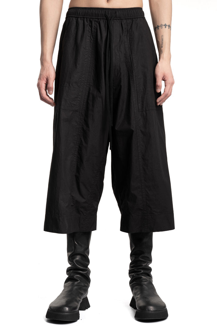 Julius_7 | SS26 - Wide Cropped Typewriter Cloth Pants, 937PAM23